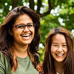 2 young female voters smiling